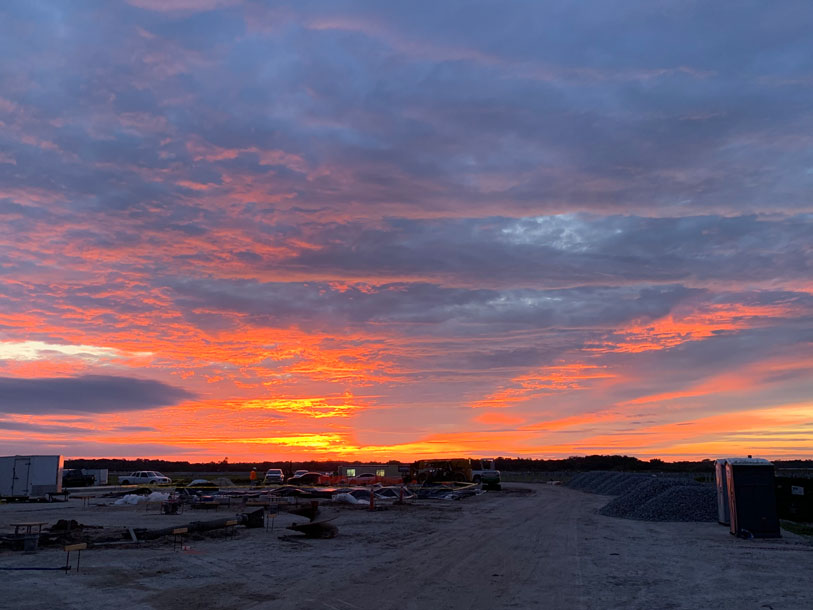 Construction site at sunset